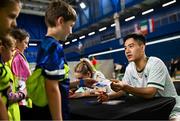 10 July 2024; Nhat Nguyen with fans during the Team Ireland Paris 2024 team training for Badminton at the National Indoor Arena on the Sport Ireland Campus in Dublin. Photo by David Fitzgerald/Sportsfile