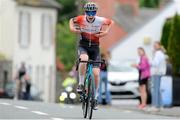 11 July 2024; Michael Collins of Skoda Munster team celebrates winning stage three of the 2024 Junior Tour of Ireland at the Burren stage in Clare. Photo by Stephen McMahon/Sportsfile