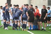 11 July 2024; Derry City players during a water break during the UEFA Champions League First Qualifying Round First Leg match between FCB Magpies and Derry City at Europa Point Stadium in Gibraltar. Photo by Marcos Moreno/Sportsfile