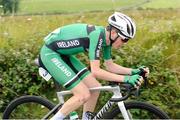 12 July 2024; Cal Tutty of Cycling Ireland team during stage four of the 2024 Junior Tour of Ireland at the Cliffs of Moher stage in Clare. Photo by Stephen McMahon/Sportsfile