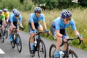 12 July 2024; Chandler Evans of Hot Tubes team leads the peloton during stage four of the 2024 Junior Tour of Ireland at the Cliffs of Moher stage in Clare. Photo by Stephen McMahon/Sportsfile