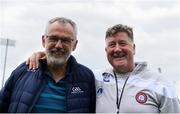 12 July 2024; New York assistant manager Michael Healy, right, and Iar-Uachtarán Chumann Lúthchleas Gael Larry McCarthy after the GAA Football All-Ireland Junior Championship semi-final match between New York and Warwickshire at the GAA National Centre of Excellence in Abbotstown, Dublin. Photo by Shauna Clinton/Sportsfile
