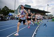 12 July 2024; Jamie Byrne of Dundrum South Dublin AC, leads the field in The Jerry Kiernan Foundation Junior Men's Mileduring the Morton Games at Morton Stadium in Dublin. Photo by Sam Barnes/Sportsfile