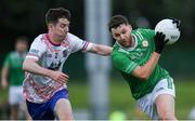 12 July 2024; Alfie McNulty of London is tackled by Seán Gavin of USGAA during the GAA Football All-Ireland Junior Championship semi-final match between USGAA and London at the GAA National Centre of Excellence in Abbotstown, Dublin. Photo by Shauna Clinton/Sportsfile