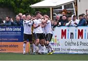 12 July 2024; Dundalk players, including Eoin Kenny, centre, celebrate their side's third goal, scored by Daryl Horgan, right, during the SSE Airtricity Men's Premier Division match between Dundalk and Drogheda United at Oriel Park in Dundalk, Louth. Photo by Ben McShane/Sportsfile