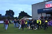 12 July 2024; Scenes at full-time as Dundalk and Drogheda United supporters fight after the SSE Airtricity Men's Premier Division match between Dundalk and Drogheda United at Oriel Park in Dundalk, Louth. Photo by Ben McShane/Sportsfile