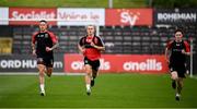 12 July 2024; Bohemians players, from left, Rob Cornwall, Brian McManus and James McManus before the SSE Airtricity Men's Premier Division match between Bohemians and Sligo Rovers at Dalymount Park in Dublin. Photo by Seb Daly/Sportsfile