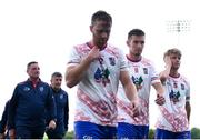 12 July 2024; USGAA players, from left, Conor Bradley, Aaron Corr and Brian McDaid dejected after their side's defeat in the GAA Football All-Ireland Junior Championship semi-final match between USGAA and London at the GAA National Centre of Excellence in Abbotstown, Dublin. Photo by Shauna Clinton/Sportsfile