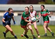 13 July 2024; Emma Higgins of Mayo in action against Eimear Gannon of Cavan during the LGFA All-Ireland U16 A Championship final match between Cavan and Mayo at Duggan Park in Ballinasloe, Galway. Photo by Michael P Ryan/Sportsfile
