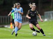 13 July 2024; Katie Lawlee of Treaty United in action against Amber Cosgrove of DLR Waves during the SSE Airtricity Women's Premier Division match between DLR Waves and Treaty United at UCD Bowl in Belfield, Dublin. Photo by Thomas Flinkow/Sportsfile