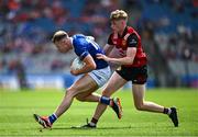 13 July 2024; Niall Dunne of Laois in action against Paddy McCarthy of Down during the Tailteann Cup Final match between Down and Laois at Croke Park in Dublin. Photo by Ray McManus/Sportsfile