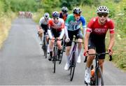 13 July 2024; Aidan Sebel of Ignite Canada team leads the breakway during stage five of the 2024 Junior Tour of Ireland at the East Clare stage in Clare. Photo by Stephen McMahon/Sportsfile