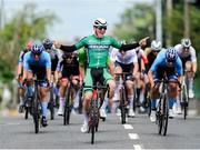 13 July 2024; Max Fitzgerald of Cycling Ireland team celebrates after winning stage five of the 2024 Junior Tour of Ireland at the East Clare stage in Clare. Photo by Stephen McMahon/Sportsfile