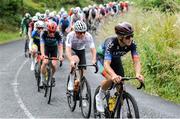13 July 2024; Paul Opie of Lee Valley Youth CC team leads the peloton during stage five of the 2024 Junior Tour of Ireland at the East Clare stage in Clare. Photo by Stephen McMahon/Sportsfile
