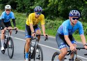 13 July 2024; Race leader Brendan Luongo of Hot Tubes team, centre, during stage five of the 2024 Junior Tour of Ireland at the East Clare stage in Clare. Photo by Stephen McMahon/Sportsfile