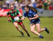 13 July 2024; Abby Reilly of Cavan in action against Emma Higgins of Mayo during the LGFA All-Ireland U16 A Championship final match between Cavan and Mayo at Duggan Park in Ballinasloe, Galway. Photo by Michael P Ryan/Sportsfile