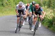 13 July 2024; Leader of the King of the Mountains Antoine Bergeron of Ignite Canada team, left, attacks during stage five of the 2024 Junior Tour of Ireland at the East Clare stage in Clare. Photo by Stephen McMahon/Sportsfile