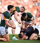 13 July 2024; Jason Foley and Brian Ó Beaglaíoch of Kerry celebrate over Rian O'Neill of Armagh during the GAA Football All-Ireland Senior Championship semi-final match between Armagh and Kerry at Croke Park in Dublin. Photo by Harry Murphy/Sportsfile