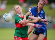 13 July 2024; Emma Higgins of Mayo in action against Kayla O'Reilly of Cavan during the LGFA All-Ireland U16 A Championship final match between Cavan and Mayo at Duggan Park in Ballinasloe, Galway. Photo by Michael P Ryan/Sportsfile