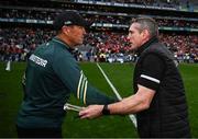 13 July 2024; Kerry manager Jack O'Connor and Armagh manager Kieran McGeeney shake hands after the GAA Football All-Ireland Senior Championship semi-final match between Armagh and Kerry at Croke Park in Dublin. Photo by Harry Murphy/Sportsfile