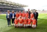 13 July 2024; INTO President Carmel Browne, LGFA Marie Hickey, Uachtarán Chumann Lúthchleas Gael Jarlath Burns, President of Cumann na mBunscol Gary Farrell,with the Armagh team, back row, left to right, Sophie Boyle, St Oliver Plunkett's NS, Monaghan, Hayley Ryan, Presentation PS, Portarlington, Laois, Ella Kenny, St Sarah's NS, Belmont, Offaly, Sorcha Collins, Carrick PS, Warrenpoint, Down, Jayne Donnelly, St Mary's PS, Edenderry, Offaly, front row, left to right, Sophie Branagan, St Paul's PS, Newry, Down, Anna McAuley, St Kieran's PS, Dunmurry, Antrim, Eva Eastwood, Ballymacrickett PS, Scroggy Road, Armagh, Janelle Mukiza, Gaelscoil Phortlaoise, Cnoc an tSamhraidh, Laois, Clara Cope, St Mary's Aughlisnafin, Castlewellan, Down, ahead of the GAA INTO Cumann na mBunscol Respect Exhibition Go Games at the GAA Football All-Ireland Senior Championship Semi-Final match between Armagh and Kerry at Croke Park in Dublin. Photo by Daire Brennan/Sportsfile