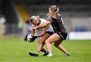 14 July 2024; Róisín Ambrose of Limerick is tackled by Brenda Bannon of Fermanagh during the TG4 All-Ireland Junior Championship semi-final match between Fermanagh and Limerick at Glennon Brothers Pearse Park in Longford. Photo by Ben McShane/Sportsfile