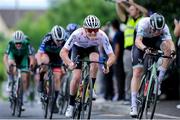 14 July 2024; Antoine Bergeron of Ignite Canada team, centre, winning stage six of the 2024 Junior Tour of Ireland at the Ennis Circuit stage in Clare. Photo by Stephen McMahon/Sportsfile