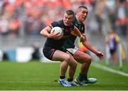 13 July 2024; Aidan Nugent of Armagh in action against Joe O'Connor of Kerry during the GAA Football All-Ireland Senior Championship semi-final match between Armagh and Kerry at Croke Park in Dublin. Photo by Seb Daly/Sportsfile