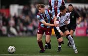 12 July 2024; Andrew Quinn of Drogheda United and Ryan O'Kane of Dundalk during the SSE Airtricity Men's Premier Division match between Dundalk and Drogheda United at Oriel Park in Dundalk, Louth. Photo by Ben McShane/Sportsfile