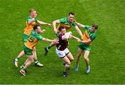14 July 2024; Cein Darcy of Galway in action against Donegal players, left to right, Oisin Gallen, Aaron Doherty, Jason McGee, and Shane O Donnell during the GAA Football All-Ireland Senior Championship semi-final match between Donegal and Galway at Croke Park in Dublin. Photo by Daire Brennan/Sportsfile