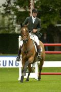 4 August 2004; Ireland's Edward Doyle on Effective during the Irish Sports Council Classic. Dublin Horse Show, Main Arena, RDS, Dublin. Picture credit; Brendan Moran / SPORTSFILE