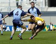 1 August 2004; John Hanly, Roscommon, in action against Dublin's Coman Goggins, (4), and Darren Magee. Bank of Ireland All-Ireland Football Championship, Round 4, Dublin v Roscommon, Croke Park, Dublin. Picture credit; Damien Eagers / SPORTSFILE
