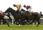 27 July 2004; Boundary,orange silks, with Pat Scallan up, during the McDonagh Builders Trade Centre Handicap also pictured is the eventual winner Loyal with Fran Berry, far side,. Galway Races, Ballybrit, Co. Galway. Picture credit; Matt Browne / SPORTSFILE