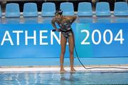 11 August 2004; A member of the Australian swimming team pokes fun at a team-mate during an open training session at the Main Olympic Swimming Pool. Games of the XXVII Olympiad, Athens Summer Olympics Games 2004, Athens, Greece. Picture credit; Brendan Moran / SPORTSFILE