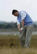 11 August 2004; John Morris, Munster, plays from the rough on the 3rd hole during the Inter-Provincial Golf Championship. Portmarnock Golf Club, Portmarnock, Dublin. Picture credit; David Maher / SPORTSFILE