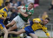 11 August 2004; Andy Moran, Mayo, in action against  Sean McDermott, Roscommon. Connacht U21 Football Championship, Roscommon v Mayo U21, Dr. Hyde Park, Roscommon. Picture credit; SPORTSFILE