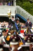 6 August 2004; Ireland's Billy Twomey on Luidam pictured with the Aga Khan Nations' Cup. Dublin Horse Show, Main Arena, RDS, Dublin. Picture credit; Matt Browne / SPORTSFILE