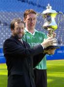 12 August 2004; President of the GAA Sean Kelly and reiging champion Paul Dunne from Louth pictured with the Corm Setanta cup after a press briefing to mark the launch of the 2004 Poc Fada competition. Croke Park, Dublin. Picture credit; Damien Eagers / SPORTSFILE