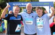 21 September 2013; Runners, from left, Damian Gallagher, Stephen Gallagher and Robert Merrigan from Rathfarnham, Dublin, after competing in the half-marathon Airtricity Dublin race series. Phoenix Park, Dublin. Picture credit: Tomás Greally / SPORTSFILE