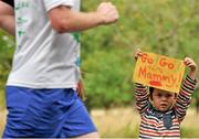 21 September 2013; Five year old Daragh Smyth, from Cavan, waits for his mother to finish the race during the half-marathon Airtricity Dublin race series. Phoenix Park, Dublin. Picture credit: Pat Murphy / SPORTSFILE