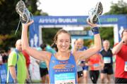 21 September 2013; Felicity Paton, from United Kingdom, after competing in the half-marathon Airtricity Dublin race series. Phoenix Park, Dublin. Picture credit: Tomás Greally / SPORTSFILE