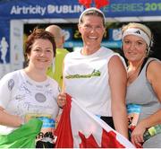 21 September 2013; Renae Rubb, centre, from Canada, Regina O'Reilly, left, and Stacey Glennon, both from Castleblaney, Co. Monaghan, after competing in the half-marathon Airtricity Dublin race series. Phoenix Park, Dublin. Picture credit: Tomás Greally / SPORTSFILE
