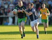 21 September 2013; Dave Morris, Corofin, Galway, in action against Michael Pollock, St. Galls, Antrim, during the 2013 FBD 7s final at Kilmacud Crokes GAA Club. The competition, now in its 41st year, attracted top club teams from all over Ireland and provided a day of fantastic football for GAA fans. Kilmacud Crokes GAA Club, Stillorgan, Co. Dublin. Picture credit: Barry Cregg / SPORTSFILE