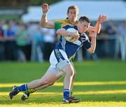 21 September 2013; CJ McGourty, St. Galls, Antrim, in action against Gary Sice, Corofin, Galway, during the 2013 FBD 7s final at Kilmacud Crokes GAA Club. The competition, now in its 41st year, attracted top club teams from all over Ireland and provided a day of fantastic football for GAA fans. Kilmacud Crokes GAA Club, Stillorgan, Co. Dublin. Picture credit: Barry Cregg / SPORTSFILE