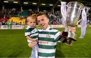 21 September 2013; Gary McCabe, Shamrock Rovers, celebrates with his 1 year old son Dylan after the game. EA Sports Cup Final, Shamrock Rovers v Drogheda United, Tallaght Stadium, Tallaght, Co. Dublin. Photo by Sportsfile