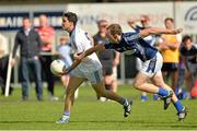 21 September 2013; Leo McLoone, Naomh Conaill, Donegal, in action against Michael Pollock, St, Galls, Antrim, during the quarter-final at the 2013 FBD 7s at Kilmacud Crokes GAA Club. The competition, now in its 41st year, attracted top club teams from all over Ireland and provided a day of fantastic football for GAA fans. Kilmacud Crokes GAA Club, Stillorgan, Co. Dublin. Picture credit: Barry Cregg / SPORTSFILE