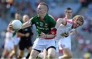 22 September 2013; Darragh Doherty, Mayo, in action against Frank Burns, Tyrone. Electric Ireland GAA Football All-Ireland Minor Championship Final, Tyrone v Mayo, Croke Park, Dublin.  Picture credit: Ray McManus / SPORTSFILE