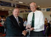 22 September 2013; Uachtarán Chumann Lúthchleas Gael Liam Ó Néill presents former Fermanagh All-Star Peter McGinnity with his 'Stars of the 80's' award before the GAA Football All-Ireland Senior Championship Final between Dublin and Mayo, Croke Park, Dublin.  Picture credit: Ray McManus / SPORTSFILE