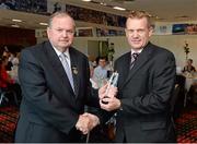 22 September 2013; Uachtarán Chumann Lúthchleas Gael Liam Ó Néill presents former Wicklow All-Star Kevin O'Brien with his 'Stars of the 80's' award before the GAA Football All-Ireland Senior Championship Final between Dublin and Mayo, Croke Park, Dublin.  Picture credit: Ray McManus / SPORTSFILE