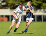 21 September 2013; Brendan McDyer, Naomh Conaill, Donegal, in action against Michael Pollock, St, Galls, Antrim, during the quarter-final at the 2013 FBD 7s at Kilmacud Crokes GAA Club. The competition, now in its 41st year, attracted top club teams from all over Ireland and provided a day of fantastic football for GAA fans. Kilmacud Crokes GAA Club, Stillorgan, Co. Dublin. Picture credit: Barry Cregg / SPORTSFILE